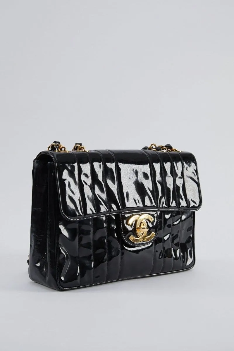 17. LP X C Chanel mademoiselle jumbo patent black flap