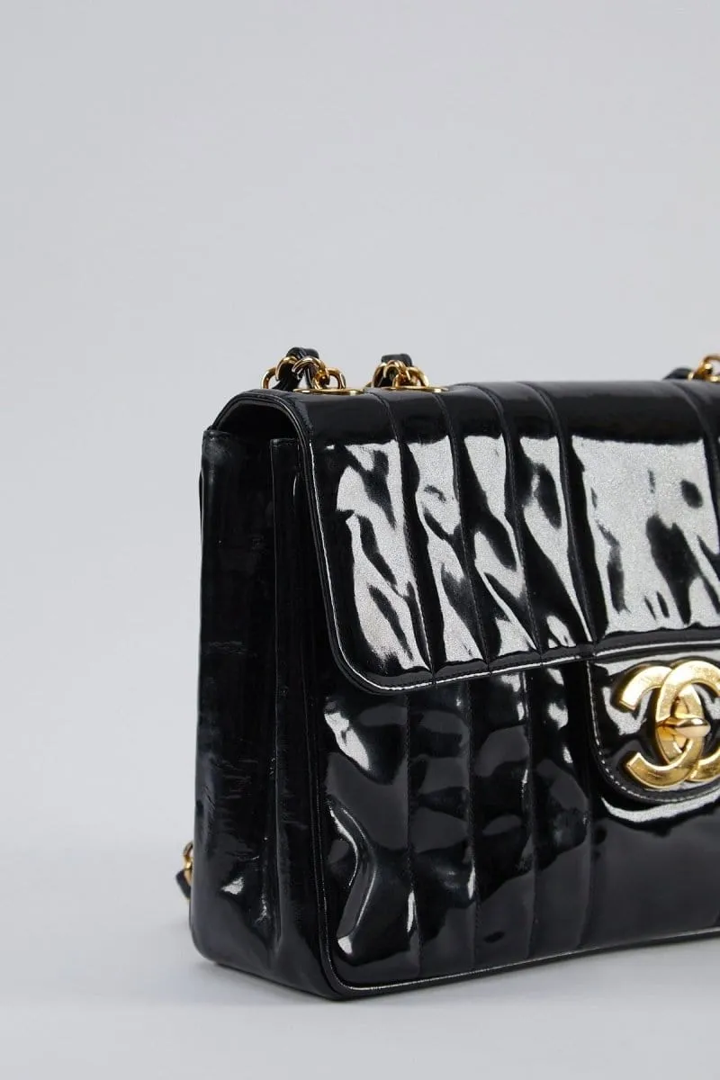 17. LP X C Chanel mademoiselle jumbo patent black flap