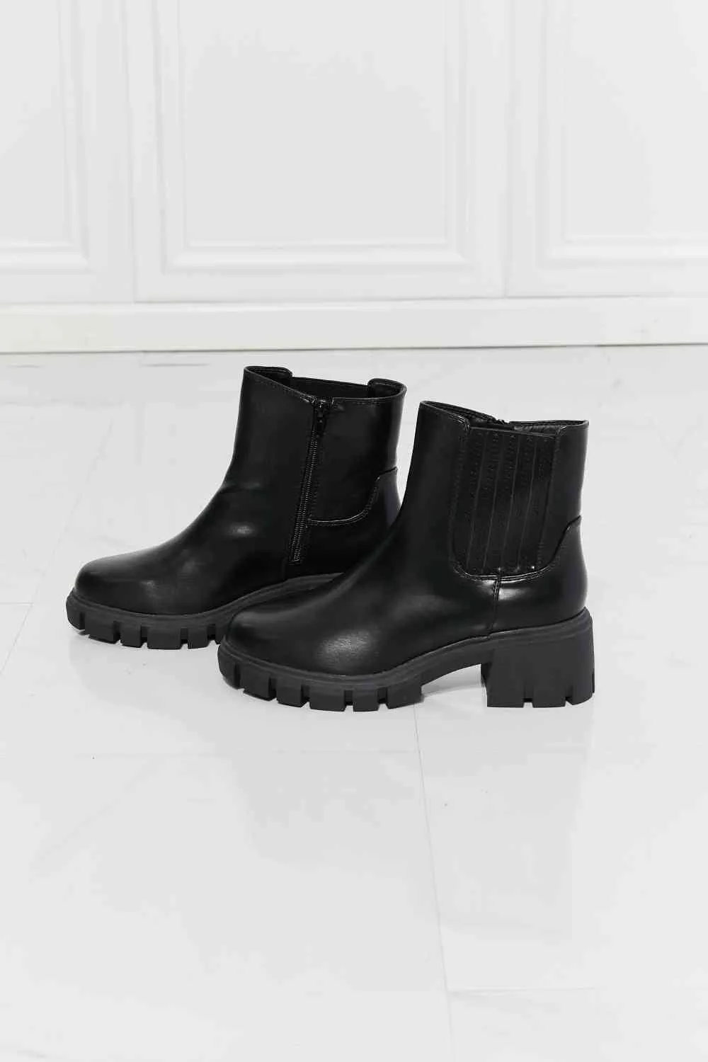 Lug Sole Chelsea Boots in Black